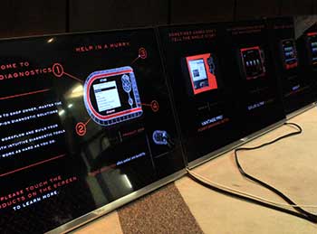 The touchscreens laid out in order on the floor for testing